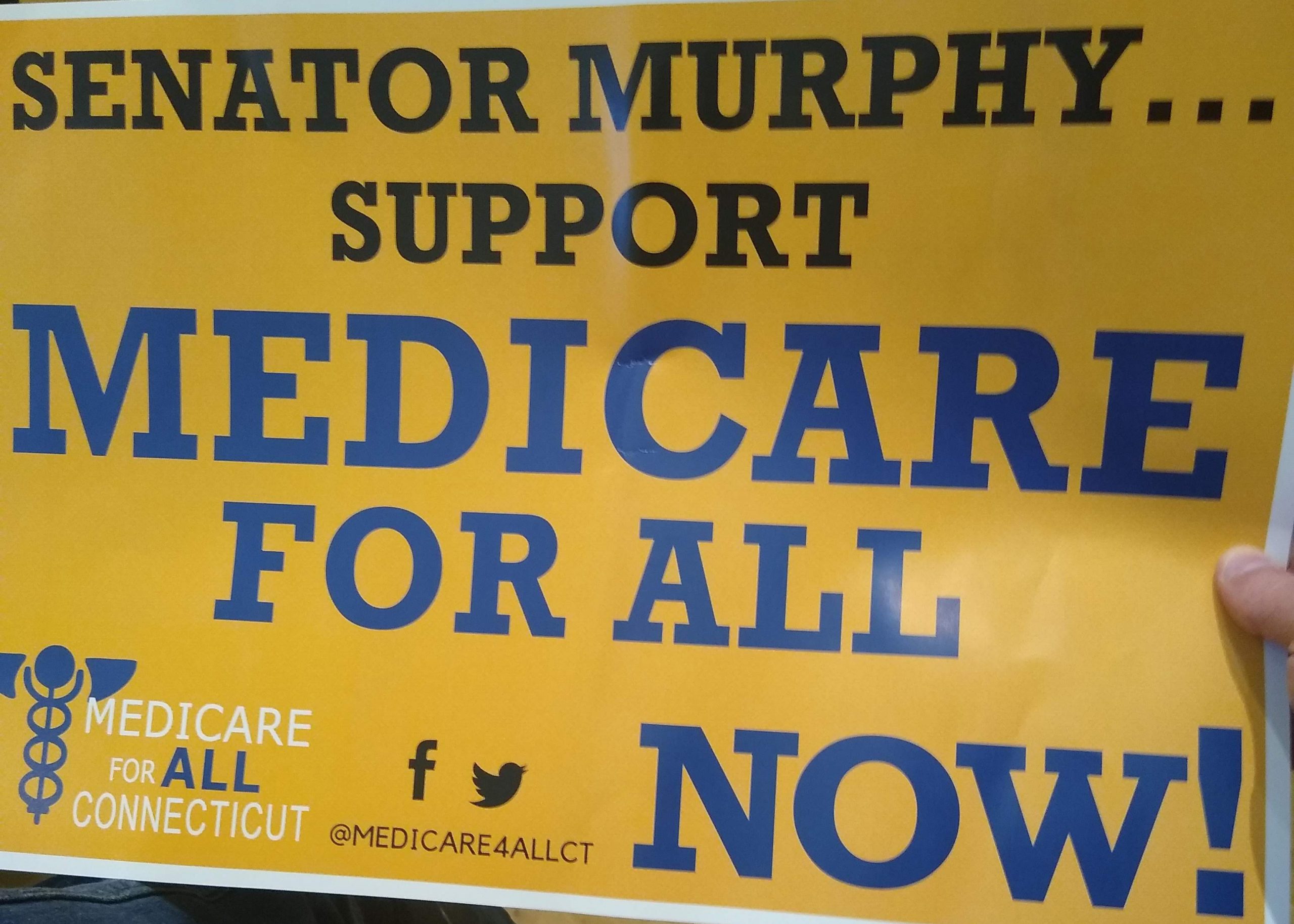 Sign that reads Senator Murphy Support Medicare for All Now