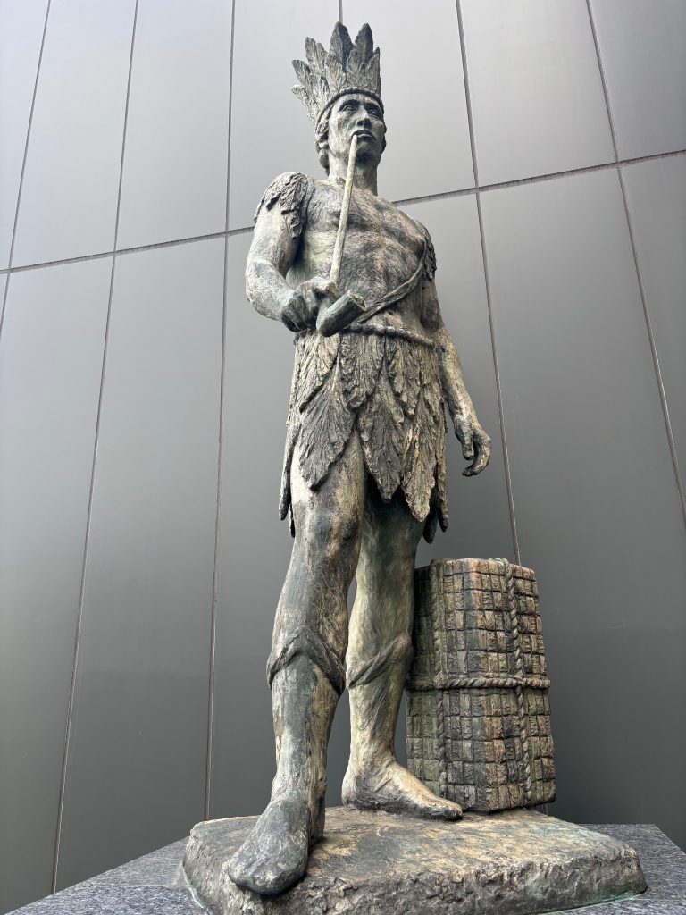 Native American statue outside. the Tobacco and Salt museum in Tokyo, Japan