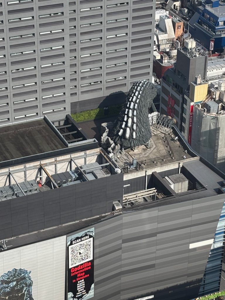 Life-size Godzilla in the Toho building in Shinjuku, Tokyo, Japan, as seen from above